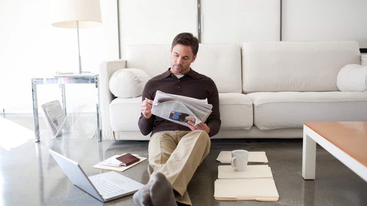 Investor reading the newspaper